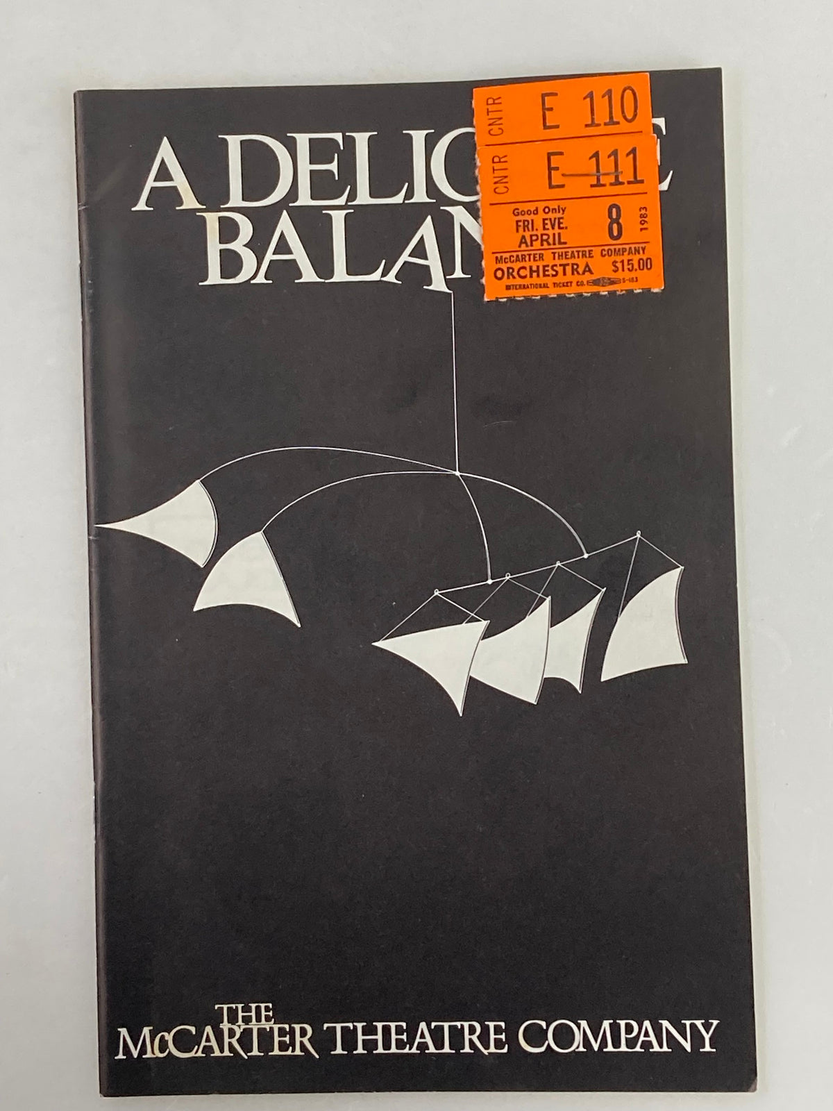 1983 Souvenir Program for A Delicate Balance, McCarter Theatre Company featuring a mobile design on the cover, indicative of the play's themes.