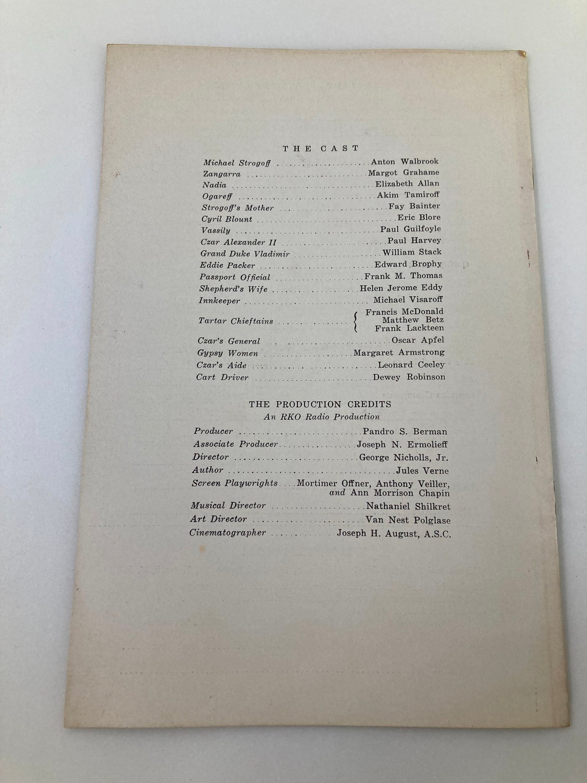 Back page of 1937 Photoplay Studies Program Vol 3 #2: The Soldier and The Lady displaying the cast and production credits of the film.