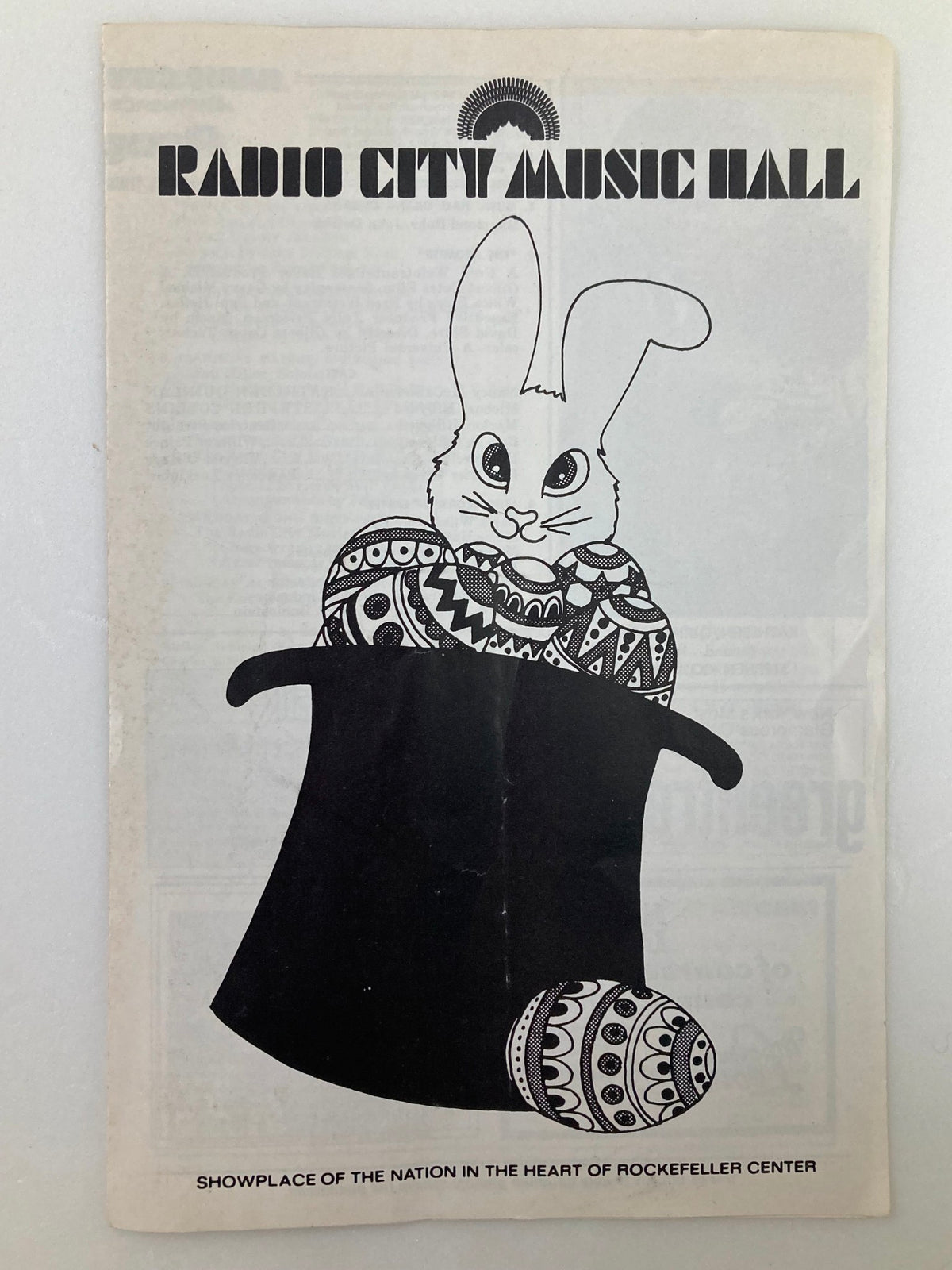 Vintage 1979 Radio City Music Hall Program cover featuring a whimsical drawing of a bunny with decorated Easter eggs, titled 'The Promise and The Glory of Easter'.