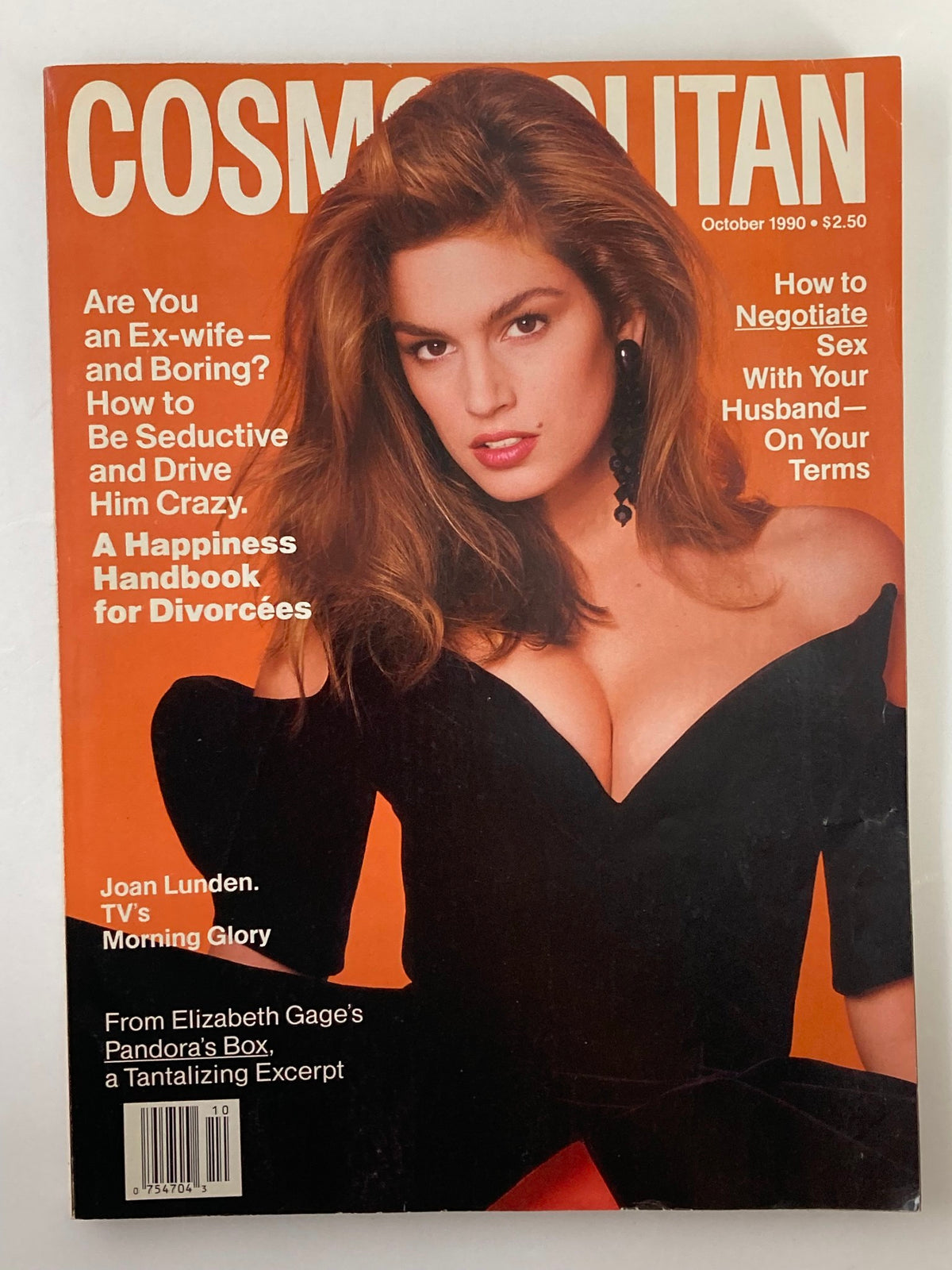 Cosmopolitan Magazine October 1990 cover featuring Cindy Crawford, a prominent supermodel, alongside Joan Lunden, highlighting pop culture and fashion of the 90s.
