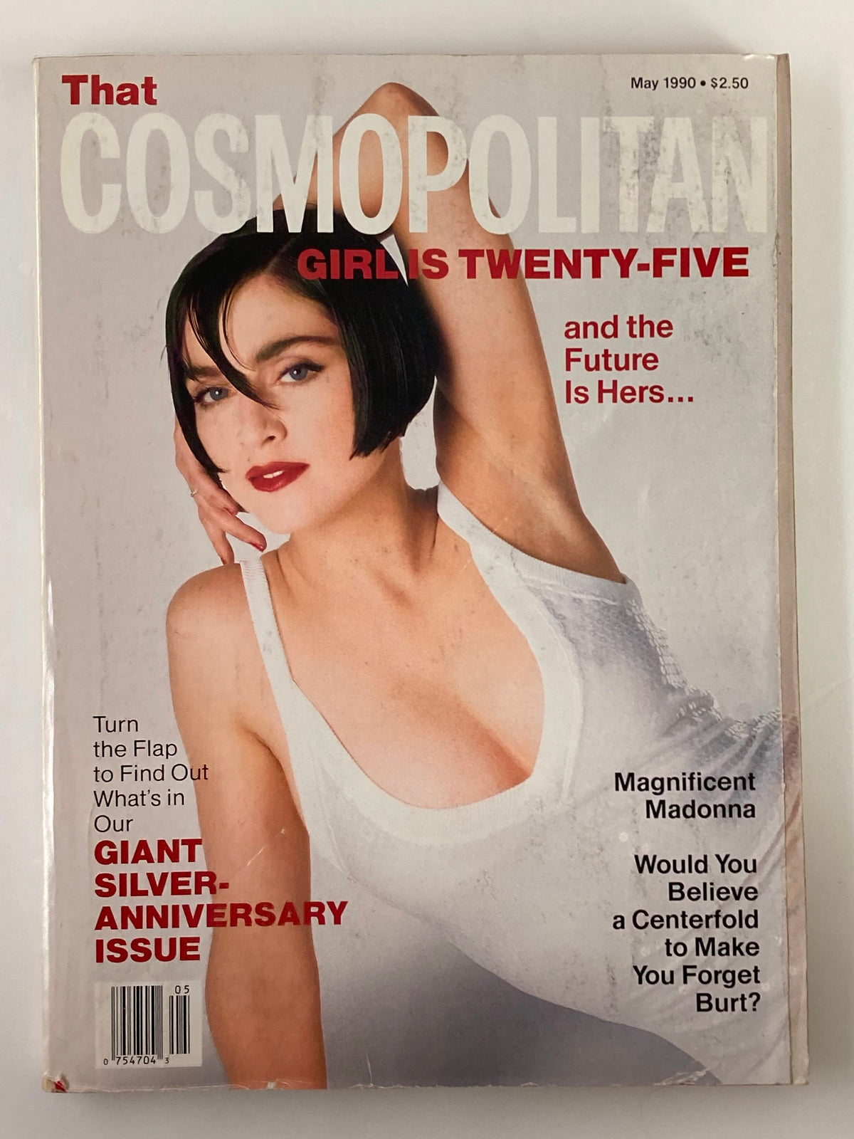 Cosmopolitan Magazine May 1990 featuring Madonna on the cover, highlighting the magazine's focus on culture and empowerment in the early 90s.