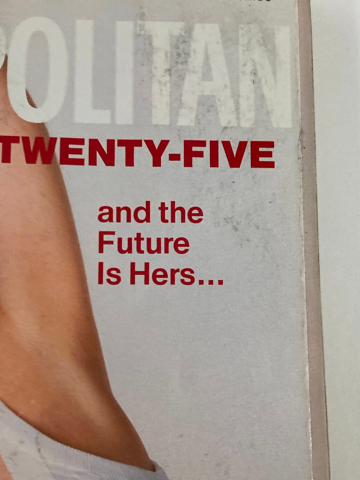 Close-up of the Cosmopolitan Magazine May 1990 cover with emphasis on the text 'GIRL IS TWENTY-FIVE and the Future Is Hers...' alongside Madonna's image.