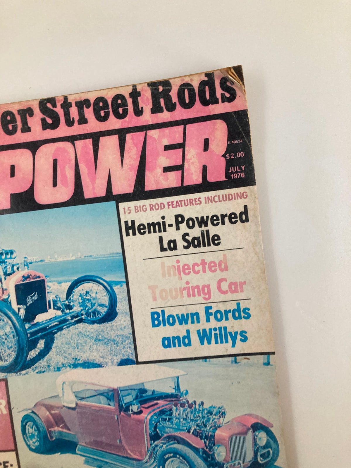Close-up of VTG Rod Power Magazine June 1976 Vol 1 #1 showcasing the featured Hemi-Powered La Salle and other classic cars.
