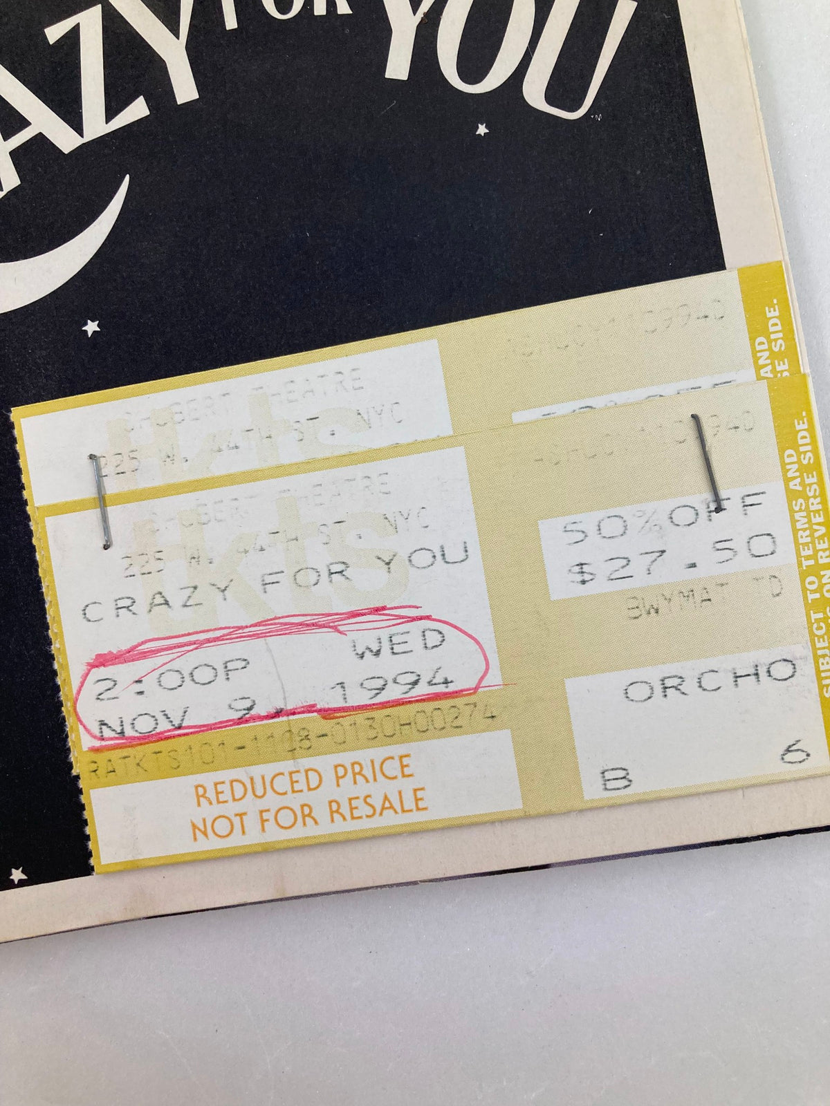 Detailed view of the ticket from the 1994 Playbill for Crazy for You showing performance time and date.
