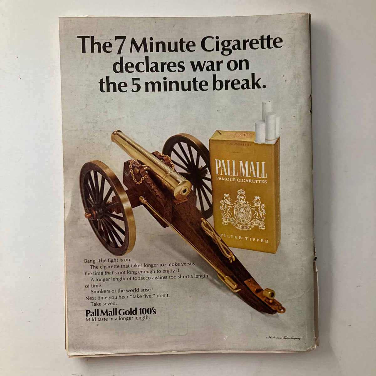 Vintage Playboy Magazine November 1967 - Advertisement featuring a cannon, promoting Pall Mall Gold cigarettes with the tagline 'The 7 Minute Cigarette declares war on the 5 minute break.'
