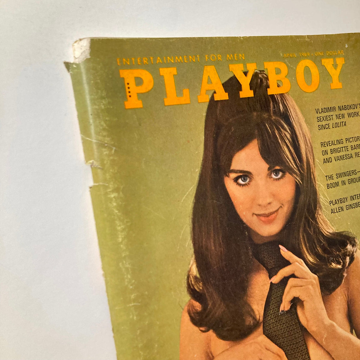 Close-up of the VTG Playboy Magazine April 1969 cover highlighting Playmate Lorna Hopper, emphasizing her captivating expression and styling.