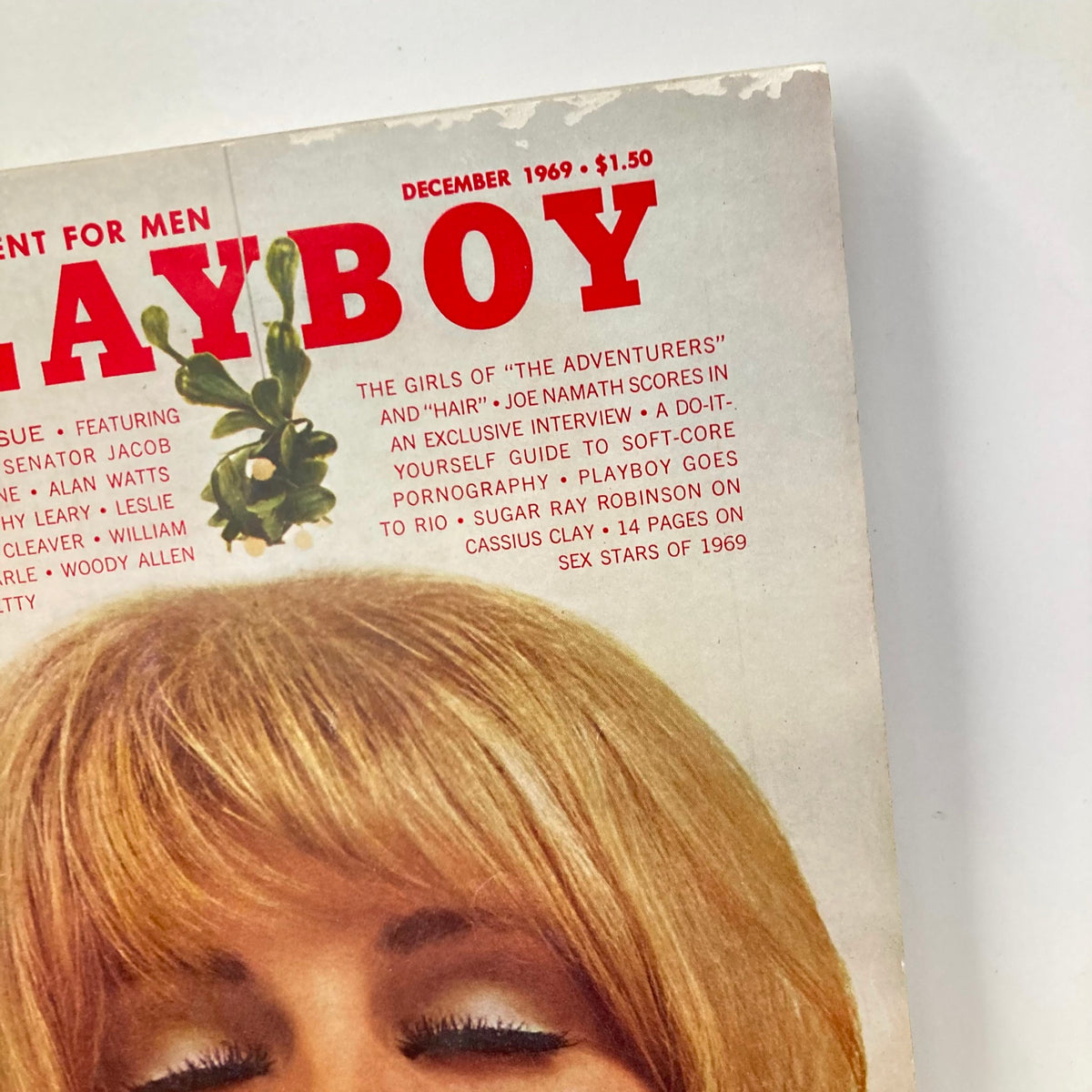 Close-up of the Vintage Playboy Magazine December 1969 cover showcasing the bold title and details, with Playmate Gloria Root prominently displayed, representing 1960s vintage magazine culture.
