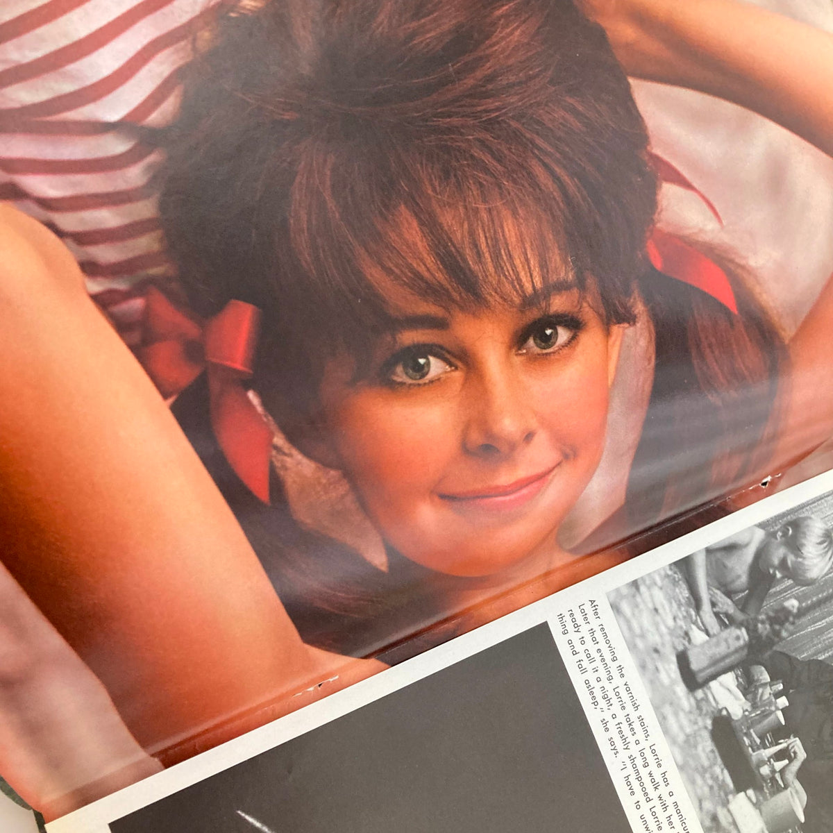 Interior view of VTG Playboy Magazine February 1969 showcasing a close-up image of a Playmate with playful pigtails and a smiling expression.