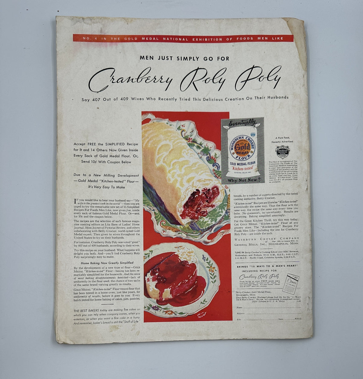 Color advertisement for 'Cranberry Roly Poly' dessert, featured in the Woman’s Home Companion Magazine November 1932. It promotes a recipe that became popular among homemakers for its delightful preparation and taste.