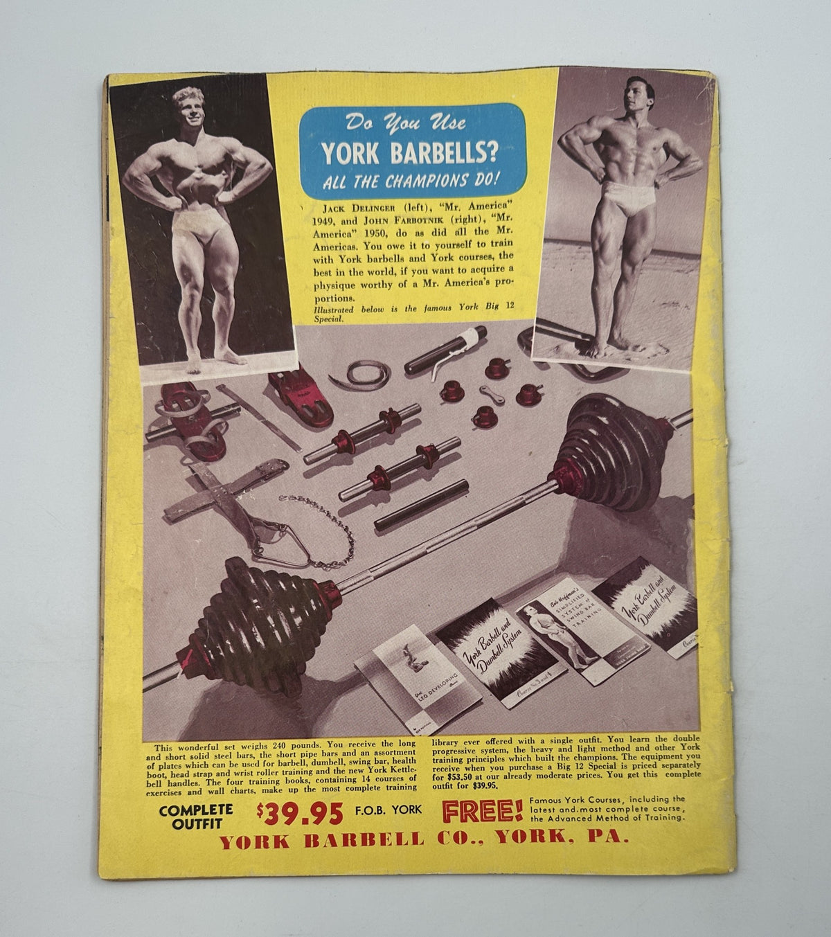 Back cover of Strength and Health Magazine April 1952 featuring a promotional ad for York Barbells, showcasing various weightlifting equipment and accessories.