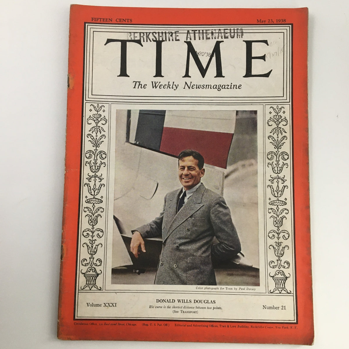 Cover of Time Magazine from May 23, 1938, Vol 31 #21 featuring industrialist Donald Wills Douglas Sr. The magazine displays a color photo of Douglas smiling, dressed in a suit, with an aircraft in the background, highlighting the aviation industry.