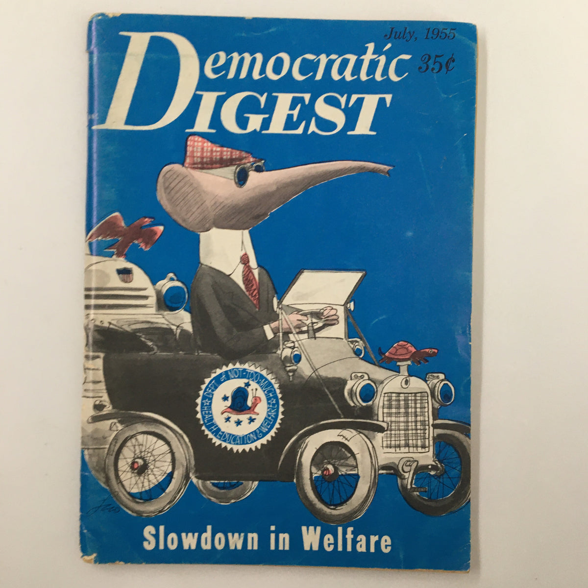 Cover of VTG Democratic Digest Magazine from July 1955 featuring the headline 'Slowdown in Welfare' with an illustrated character in a vintage car.