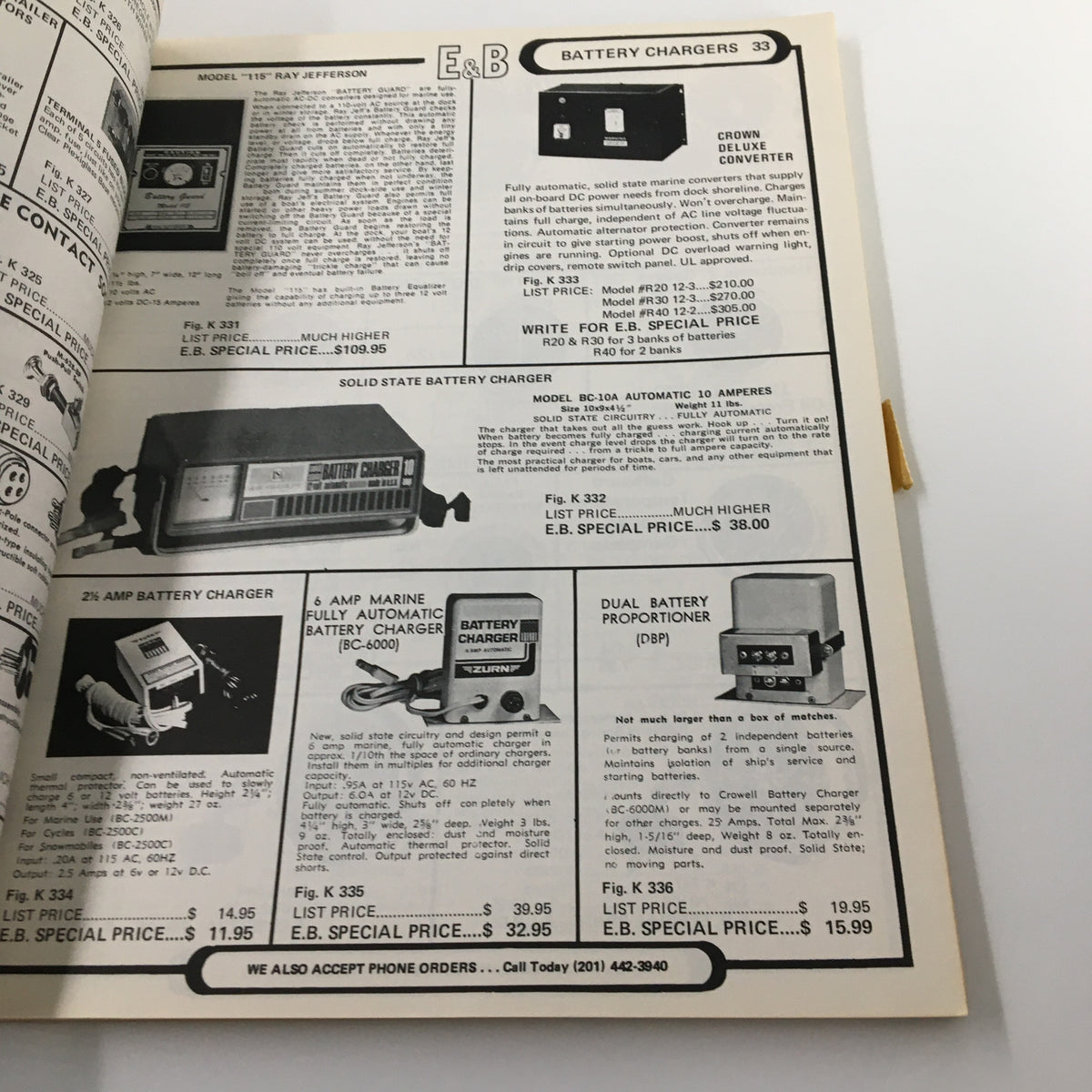 Inside page of the VTG 1973 E&B Marine Supply Complete Marine Buyers Guide Catalog displaying battery chargers and their specifications.