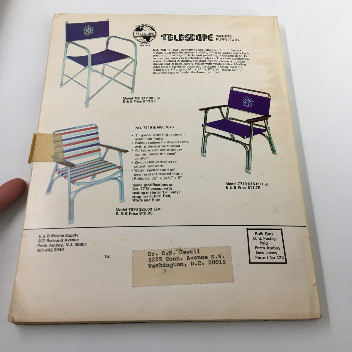 Back cover of the VTG 1973 E&B Marine Supply Complete Marine Buyers Guide Catalog featuring marine furniture advertisements and contact information.