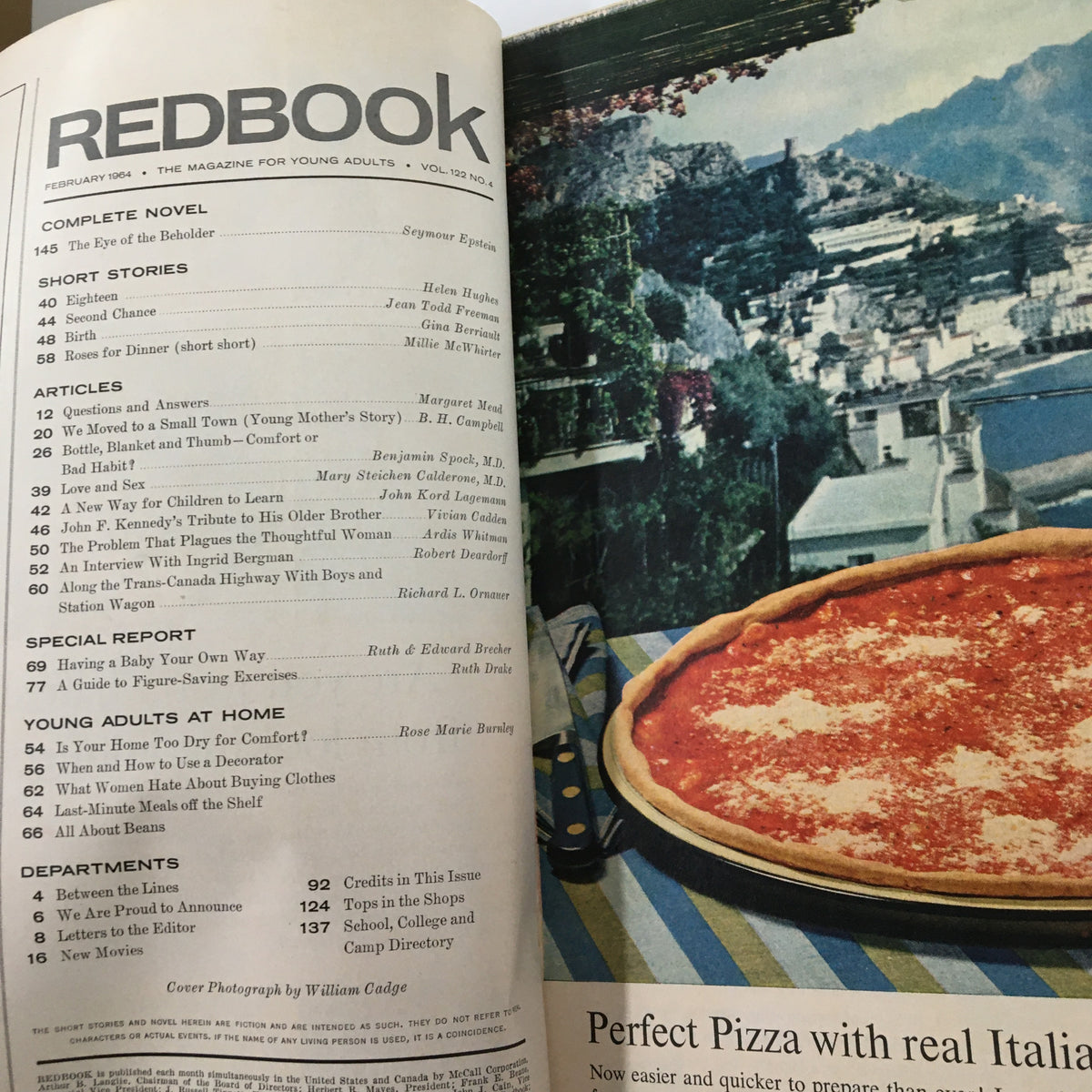 Inside page of VTG Redbook Magazine February 1964 displaying the table of contents with titles like 'The Eye of the Beholder' and 'Roses for Dinner', along with a colorful photo of pizza.