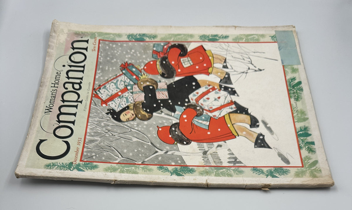 Side view of the December 1932 Woman’s Home Companion magazine cover showcasing a festive illustration of children in winter attire carrying Christmas gifts.