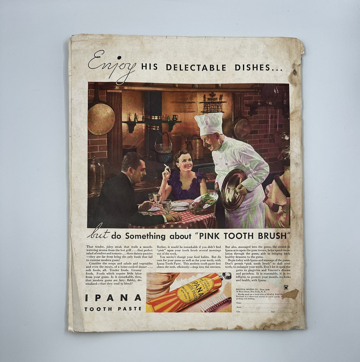 Back cover of Woman’s Home Companion Magazine June 1934 featuring a colorful advertisement for Ipana Tooth Paste, with a chef serving a meal.