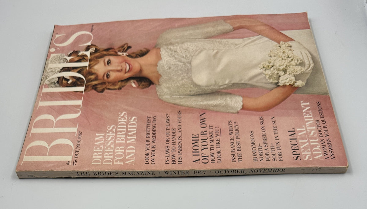 Bride's Magazine October/November 1967 angled view showing the cover and side, featuring vintage bridal fashion and tips for a perfect wedding.