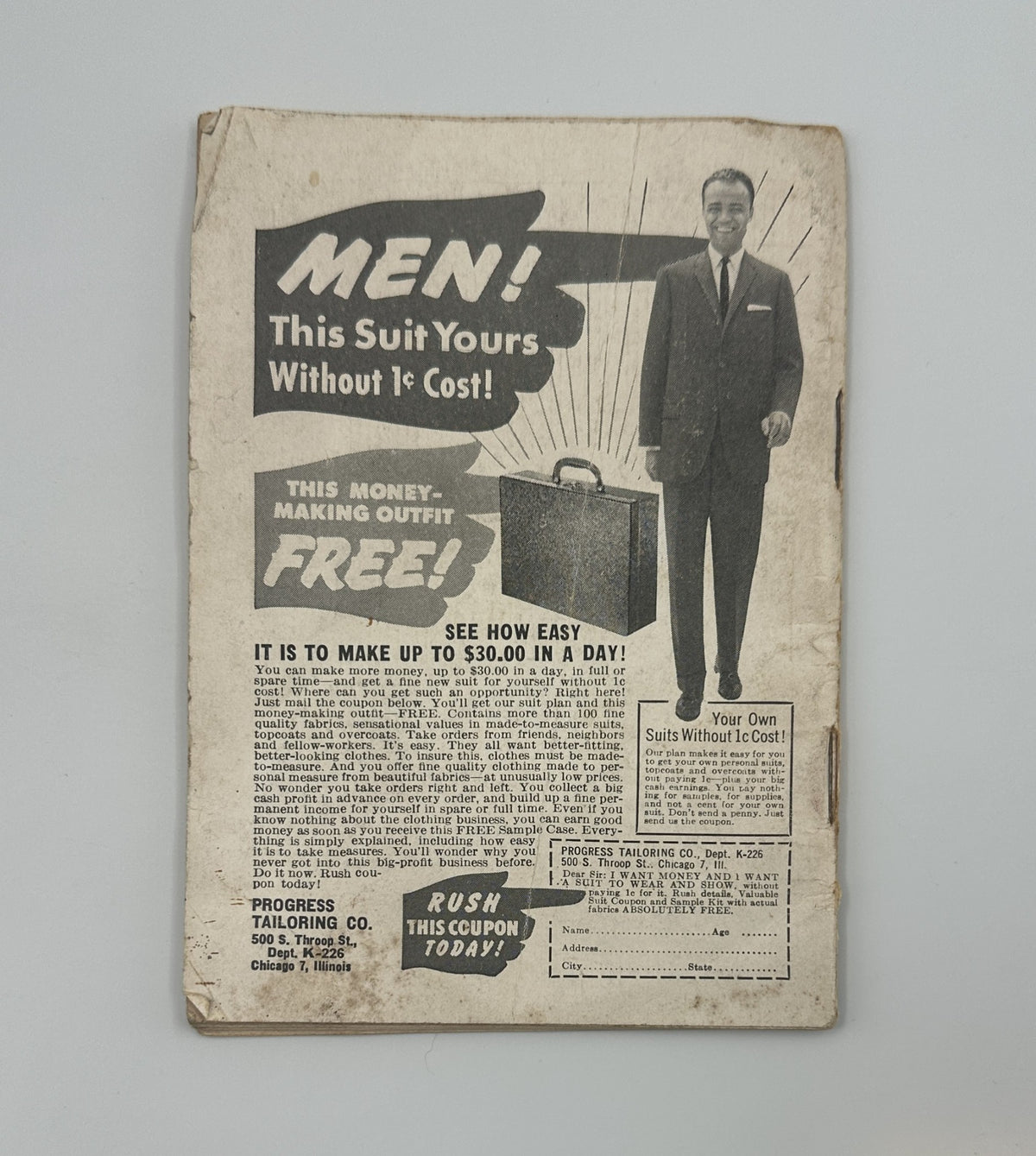 Back cover of Jet Magazine September 29, 1960 featuring a promotional advertisement for a men's suit offer, captioned 'Men! This Suit Yours Without 1¢ Cost!'