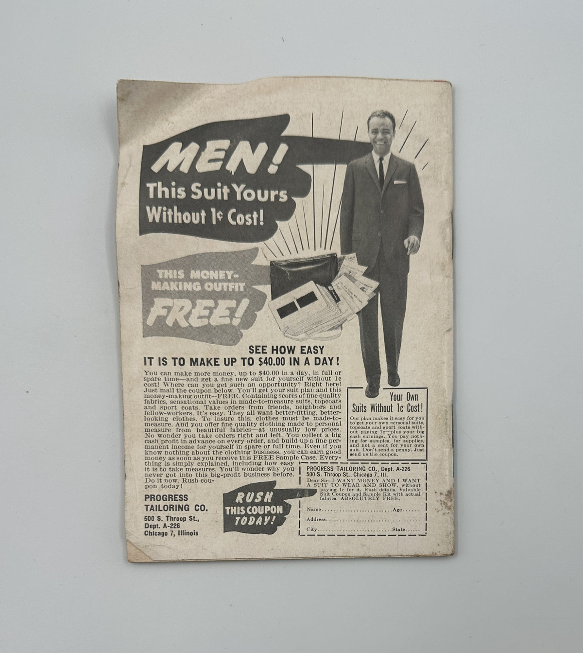 Vintage advertisement from Jet Magazine June 22, 1961, featuring a man in a suit promoting a suit offer for men, emphasizing low-cost options and savings. This ad highlights 'Men! This Suit Yours Without 1¢ Cost!' and is part of the historical context of civil rights activism from the era.