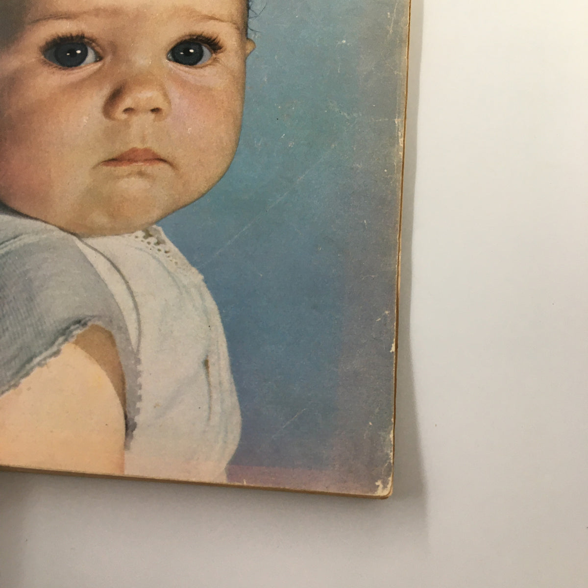 Cover of the Vintage Woman's Day Magazine March 1950, featuring a close-up portrait of a baby with large blue eyes, reflecting mid-century childhood.