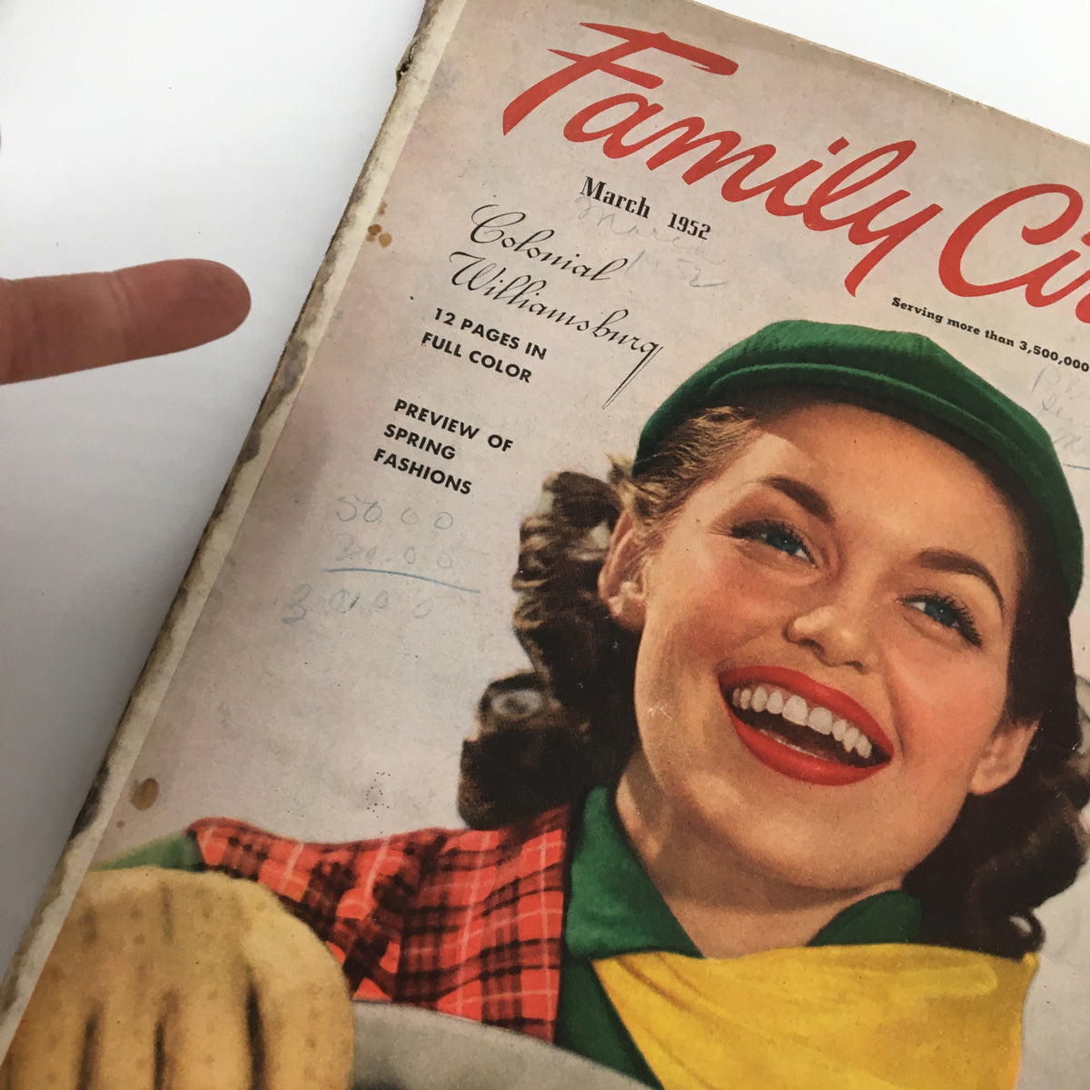 Close-up of VTG Family Circle Magazine March 1952 cover showing a young woman in a green hat and yellow scarf, emphasizing the theme of Easter Dinner.