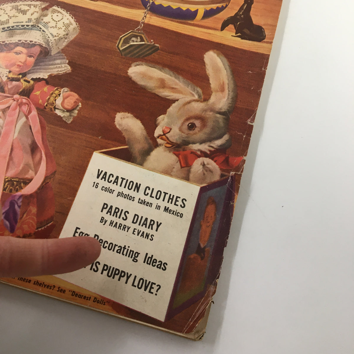 Close-up of Vintage Family Circle Magazine April 1954 cover highlighting egg-decorating ideas and a bunny.