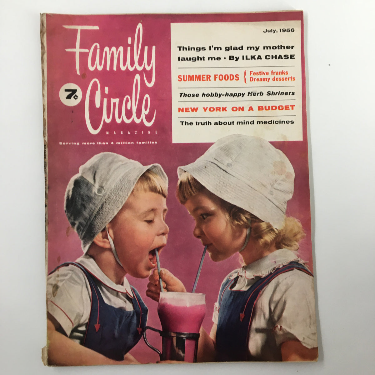 Cover of the July 1956 issue of Family Circle Magazine featuring two children enjoying a milkshake, titled 'Those Hobby-Happy Herb Shriners'. The magazine highlights summer foods and includes articles on budgeting and motherhood.