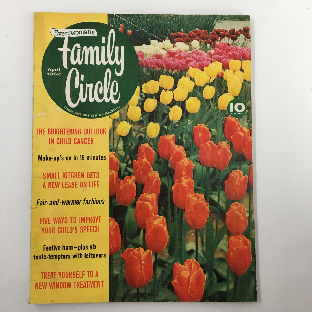 Cover of VTG Family Circle Magazine April 1962 featuring colorful tulips and headlines about child care, fashion trends, and homemaking tips.