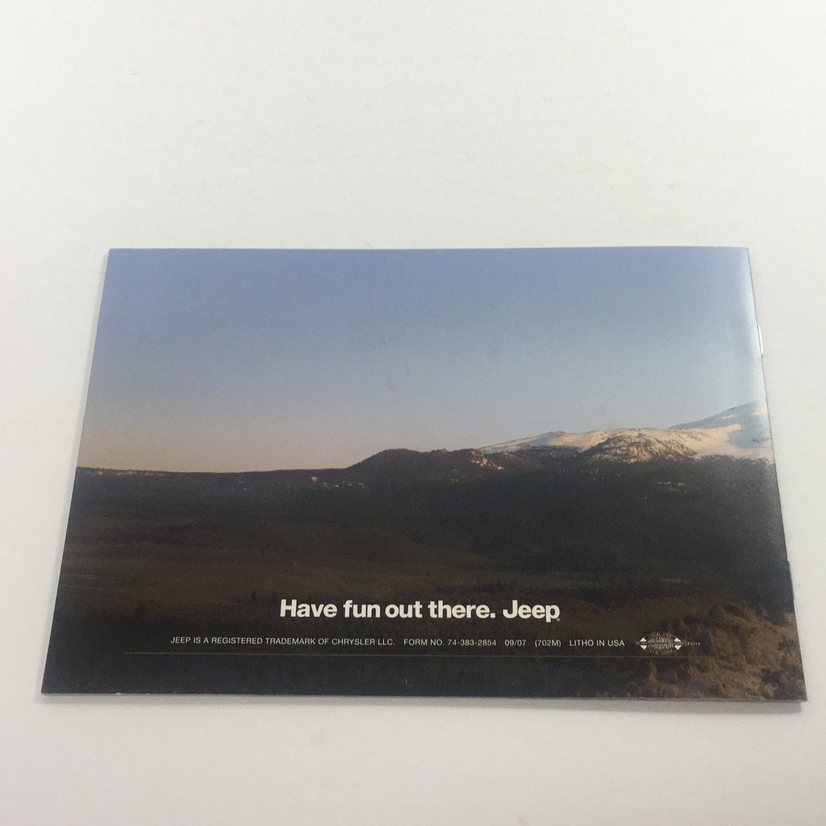 Back cover of the 2008 Jeep Compass Patriot Liberty Wrangler Dealership Car Auto Brochure Catalog with a scenic view and the text 'Have fun out there. Jeep'.