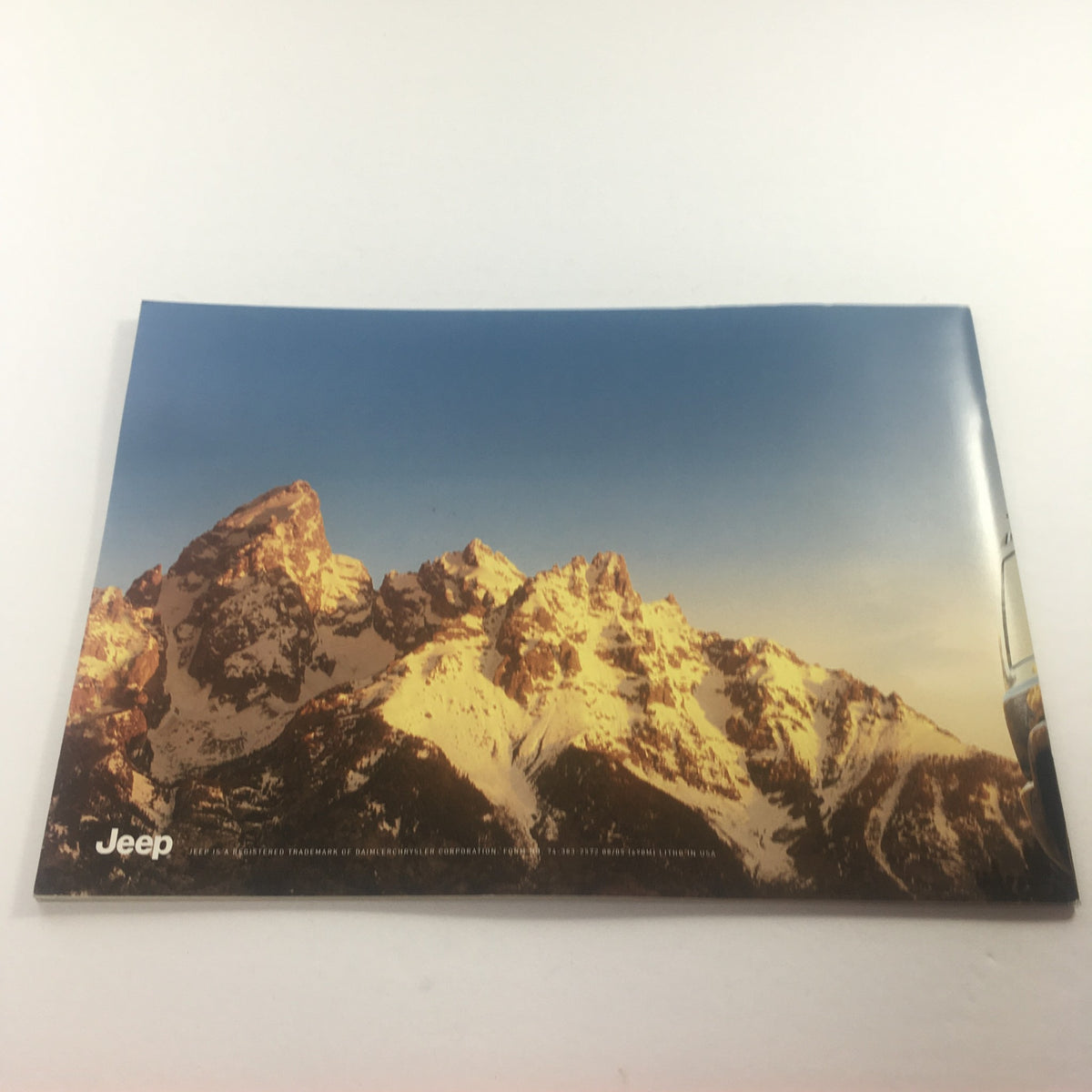 Back cover of the 2006 Jeep Commander Dealership Car Auto Brochure Catalog featuring a scenic mountain backdrop, representing adventure and the spirit of the Jeep brand.