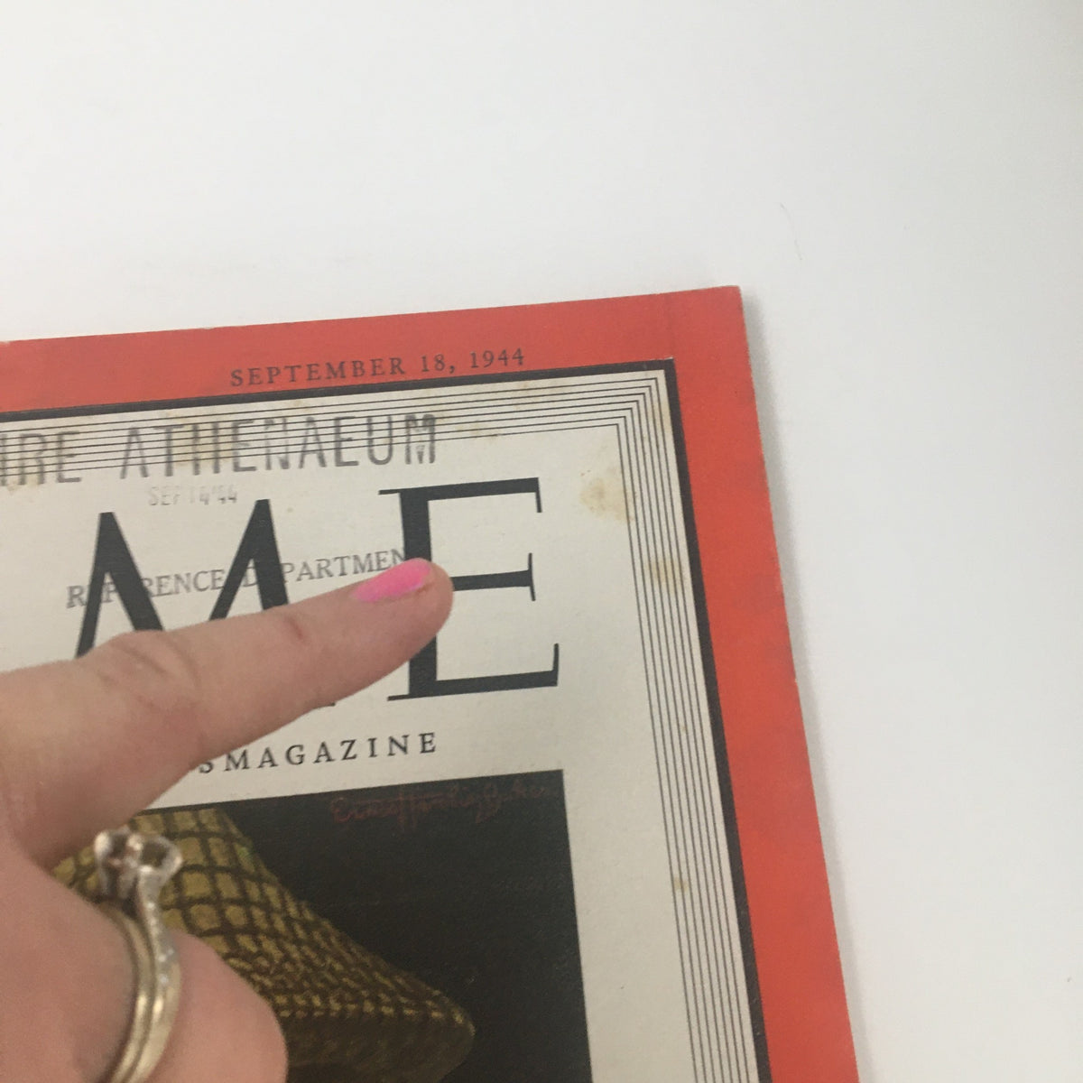Detailed view of Time Magazine September 18 1944 Vol 44 #12, focusing on the magazine title and condition, with markings indicating its vintage nature.