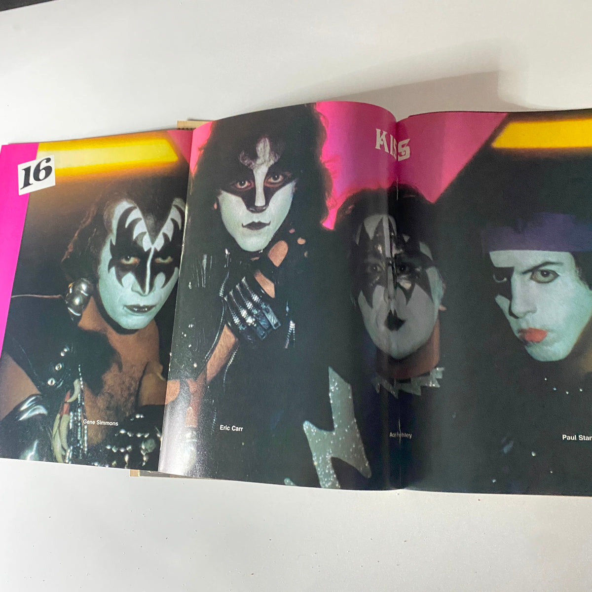 16 Magazine February 1982 featuring KISS members Gene Simmons, Eric Carr, and Paul Stanley with vibrant colors and distinctive makeup