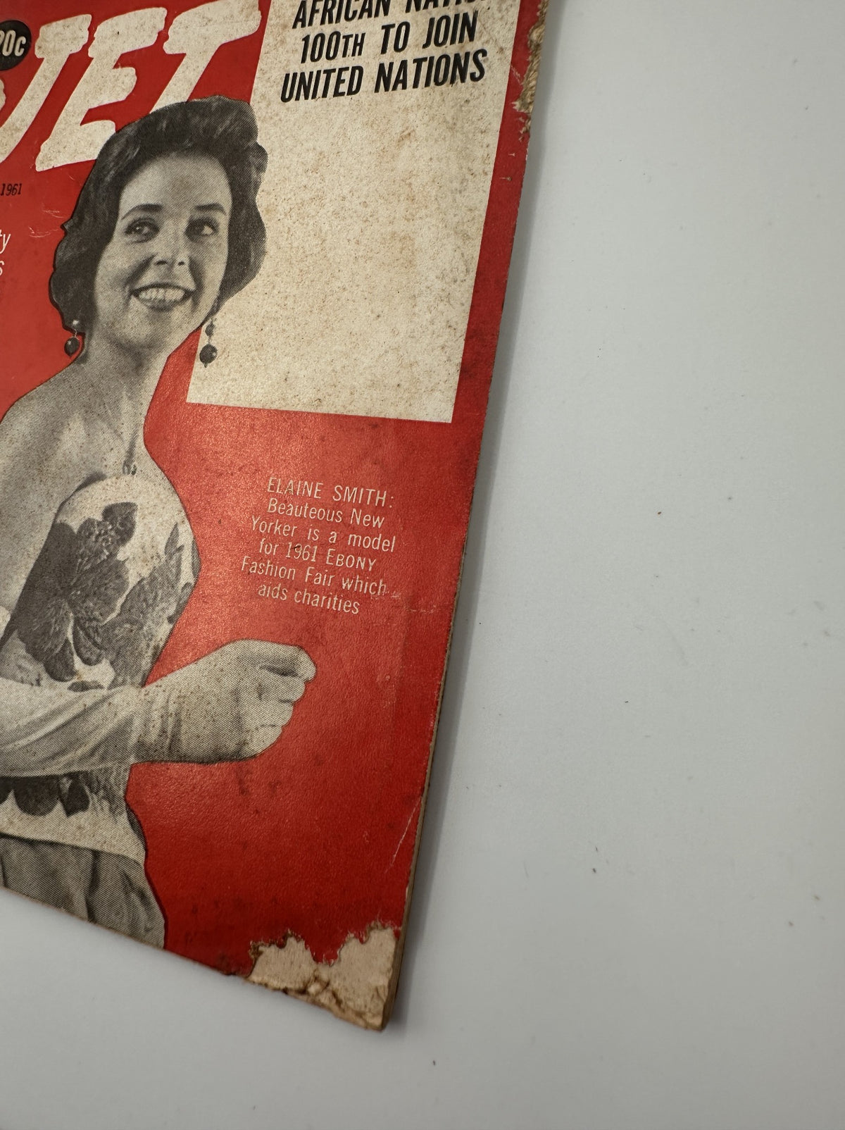 Close-up view of Jet Magazine October 19, 1961 cover featuring Elaine Smith, with text emphasizing African Nation joining the United Nations and details about the fashion event supporting charities.