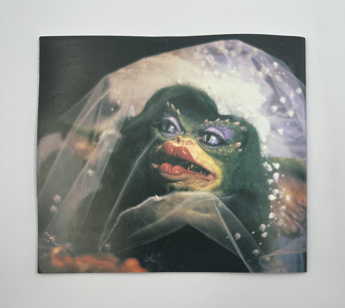 Image from Cinefex Magazine May 1991 No. 46 featuring a female gremlin dressed in a wedding veil, showcasing creative character design and special effects from the film Gremlins 2.