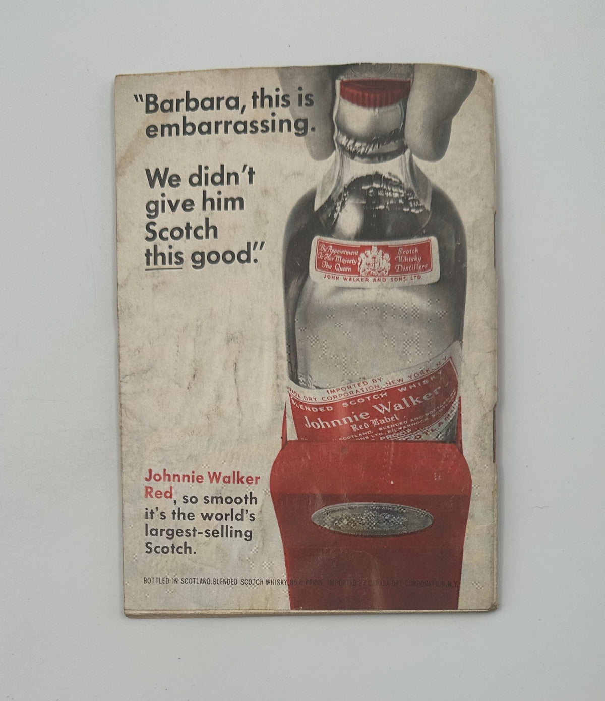 Advertisement from Jet Magazine November 11, 1965 for Johnnie Walker Red Scotch, featuring an illustration that humorously involves a conversation about the product.