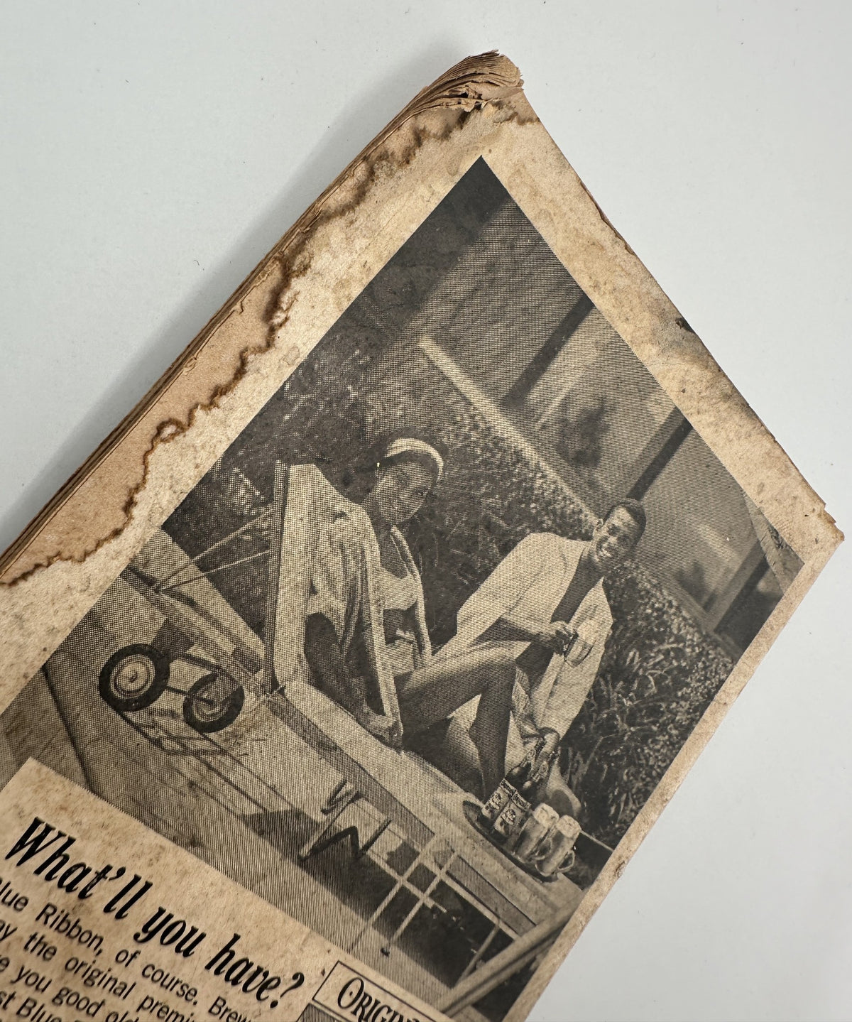 Back cover of Jet Magazine July 22, 1965 showing an image of two individuals lounging by a pool, advertising products.