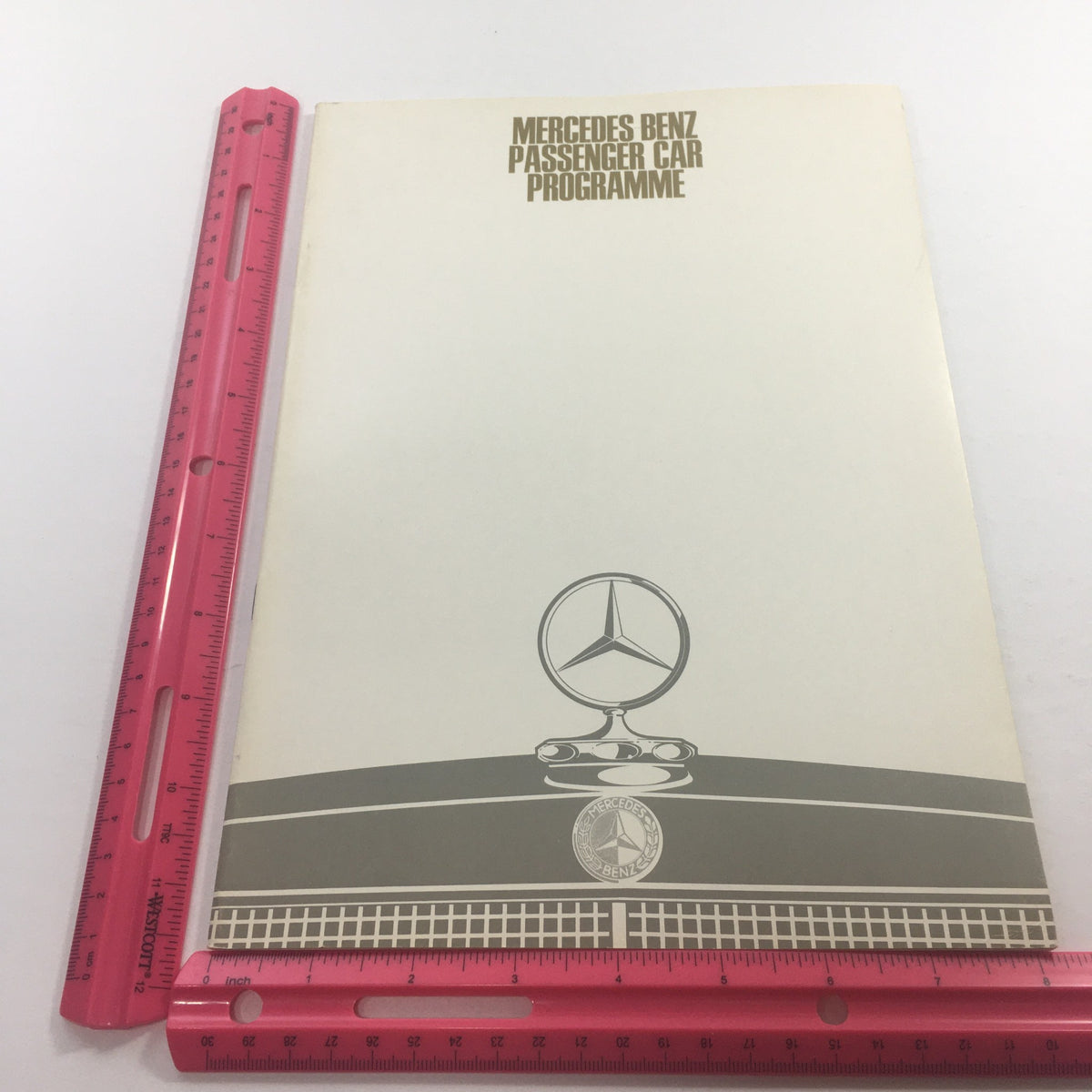 Cover page of the 1960s Mercedes-Benz 220-D Program Passenger Dealership Auto Brochure Catalog featuring the iconic Mercedes-Benz logo.
