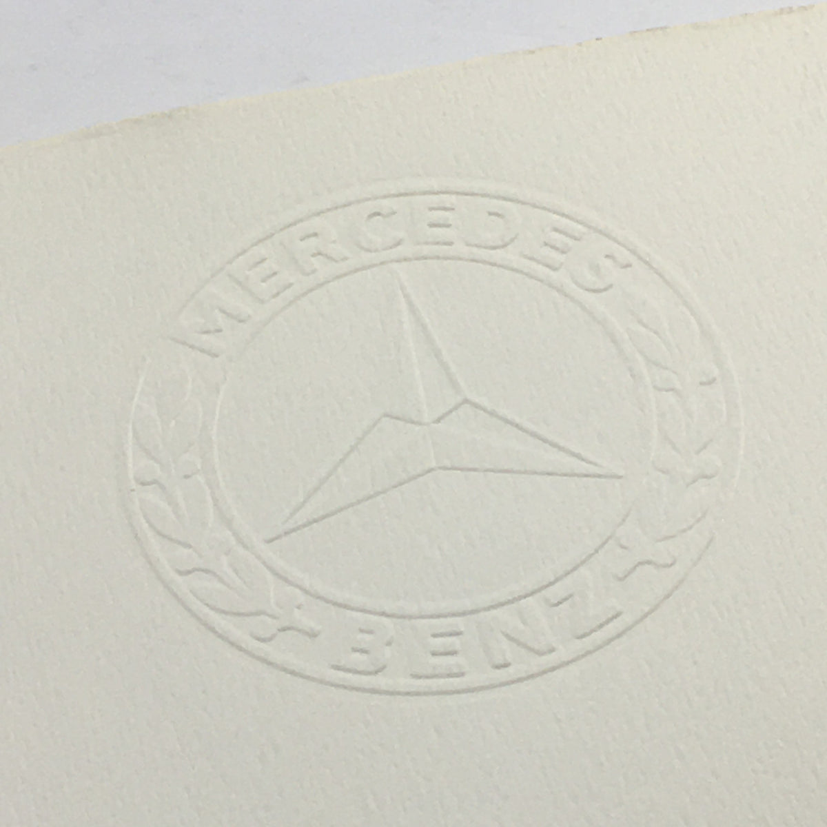 Embossed Mercedes-Benz logo on the cover of the 1954 Mercedes-Benz 300-SL Fuel Injection Dealership Car Auto Brochure Catalog.