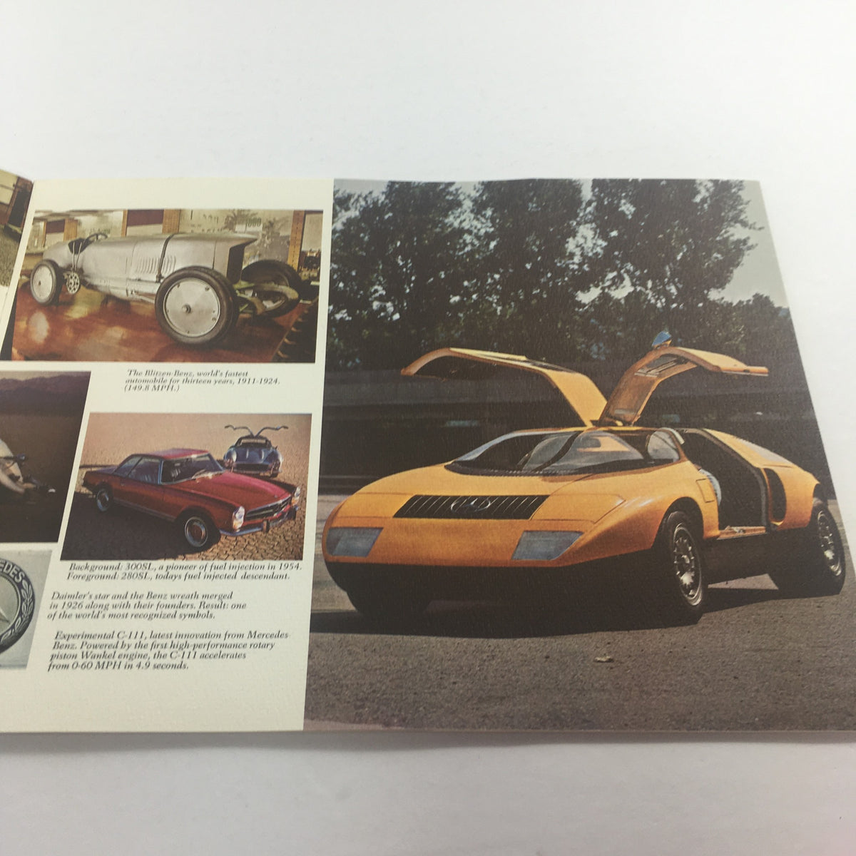 Interior page of the 1954 Mercedes-Benz 300-SL Fuel Injection Dealership Car Auto Brochure Catalog displaying the iconic Mercedes-Benz 300-SL with its signature gullwing doors.