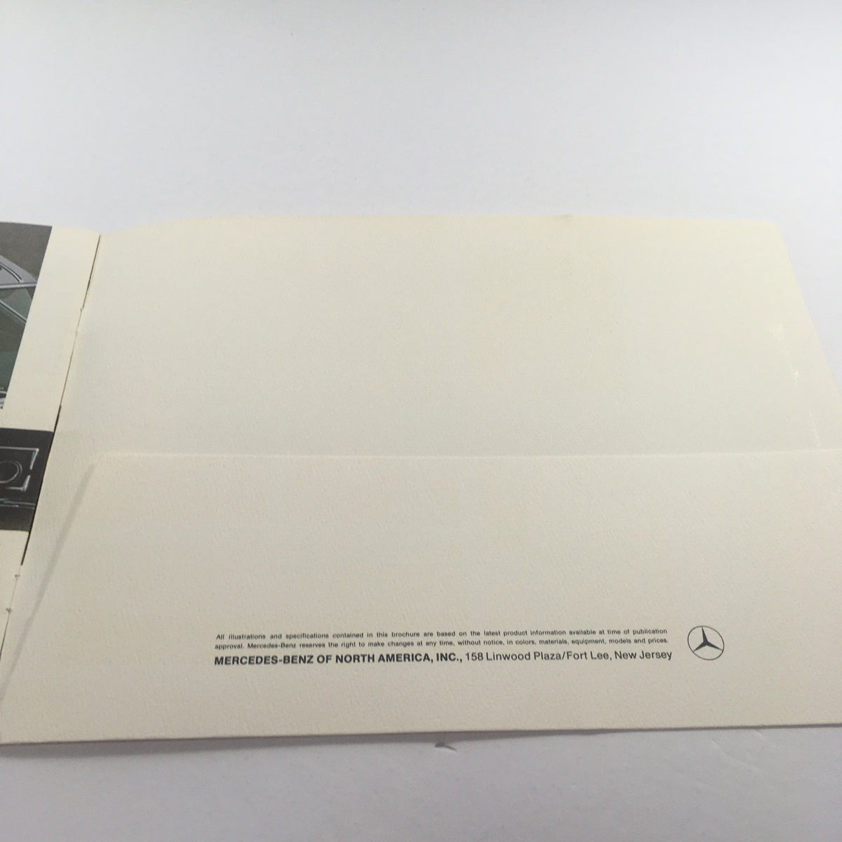 Back cover of the 1954 Mercedes-Benz 300-SL Fuel Injection Dealership Car Auto Brochure, highlighting the Mercedes-Benz logo.