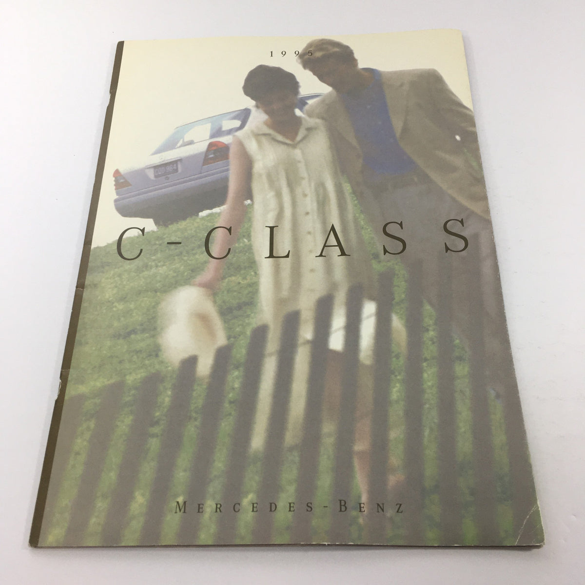 1995 Mercedes-Benz C-Class Sedan Dealership Car Auto Brochure Catalog cover featuring a couple standing near the vehicle.