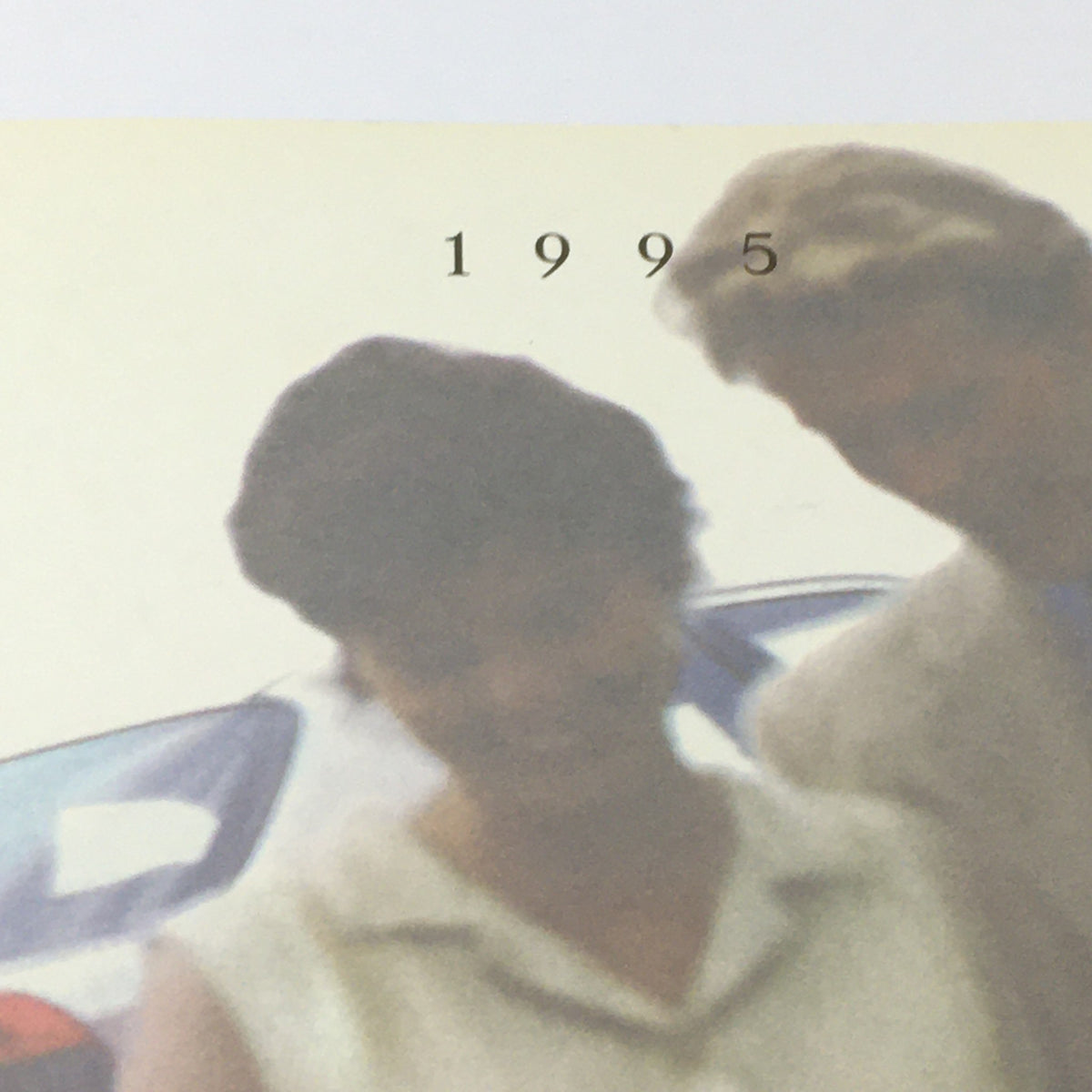 1995 Mercedes-Benz C-Class Sedan brochure detail with the year '1995' highlighted, emphasizing the catalog's focus on the model.