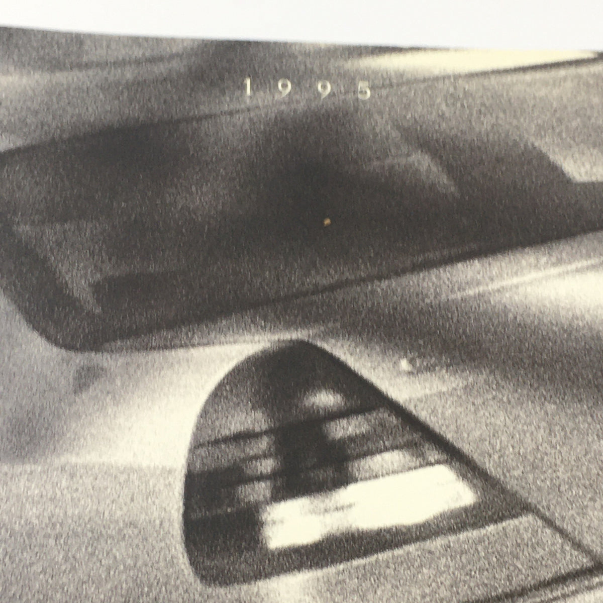 Close-up of the 1995 Mercedes-Benz C-Class C-36 Sedan Brochure cover detailing the year, highlighting its classic appeal.