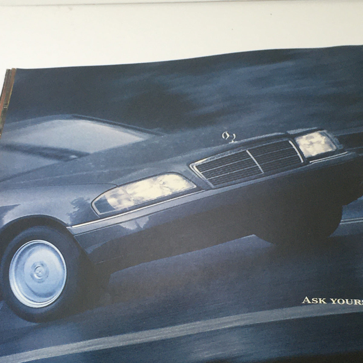 1995 Mercedes-Benz C-Class C-36 Sedan in action on the road, depicted in the dealership catalog, emphasizing its performance and luxury.