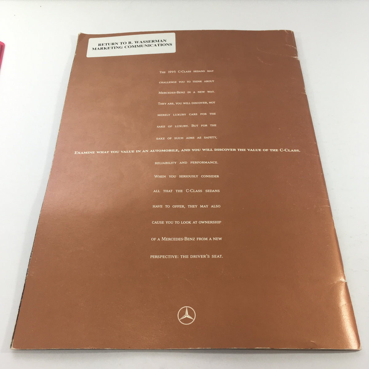 Back cover of the 1995 Mercedes-Benz C-Class C-36 Sedan Dealership Car Auto Brochure Catalog, showcasing marketing communications and features of the vehicle.