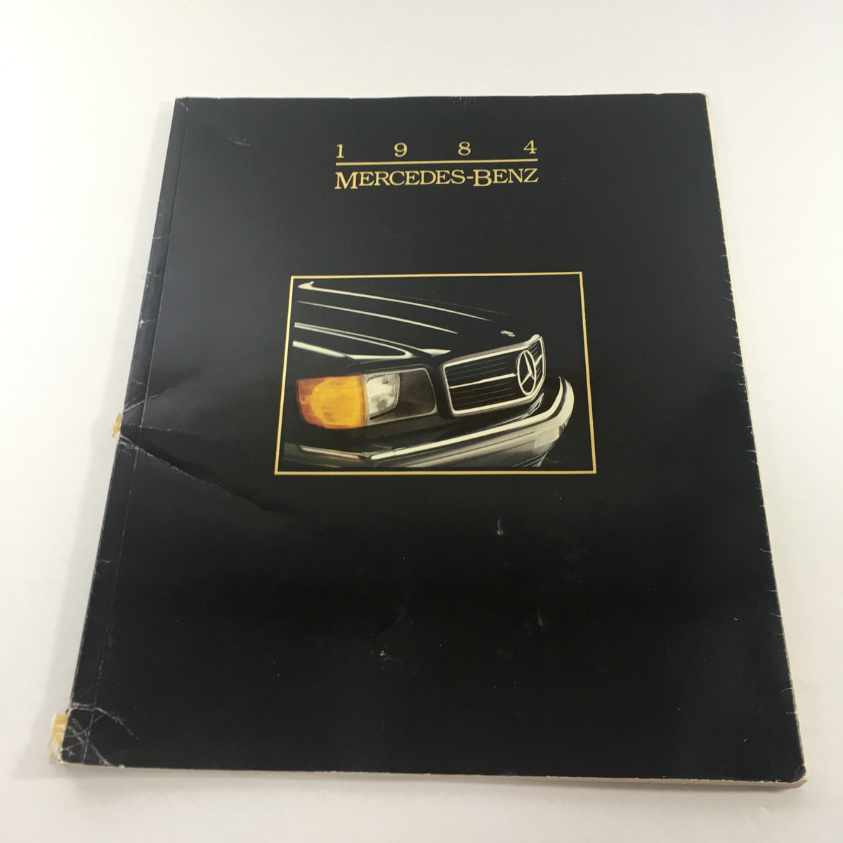 Cover of the 1984 Mercedes-Benz 190E 2.3/190D 2.2 Sedans Dealership Car Auto Brochure showcasing the car design.