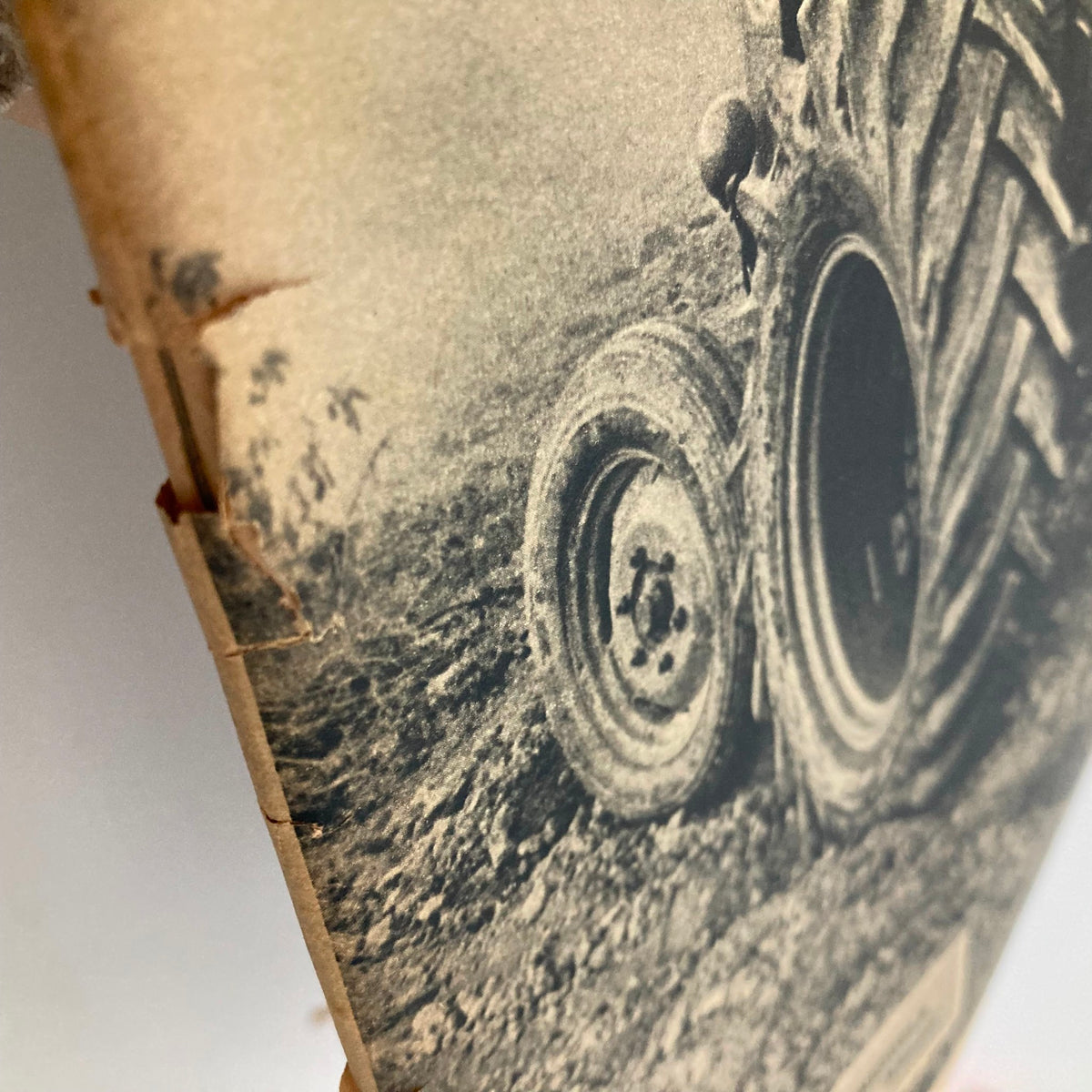 Close-up image of a vintage magazine spine showing wear and tear, from The New York Times Magazine November 24 1963, indicating its age.