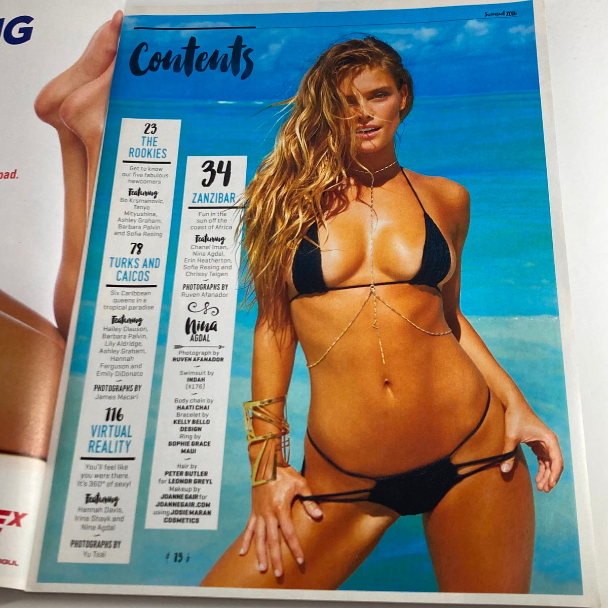 Contents page from the Sports Illustrated Magazine Winter 2016 Ashley Graham Swimsuit Issue showcasing swimwear fashion features with a model in a black bikini on the beach.