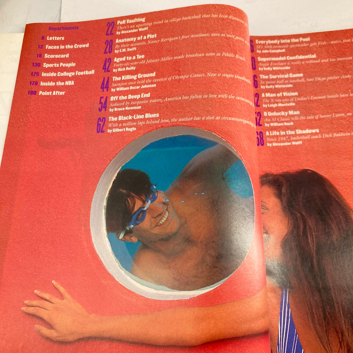 Inside page of Sports Illustrated Magazine February 14 1994, featuring articles including 'Poll Vaulting', 'Anatomy of a Plot', and 'The Killing Ground'. The page displays department listings and a smiling swimmer looking through a circular opening.